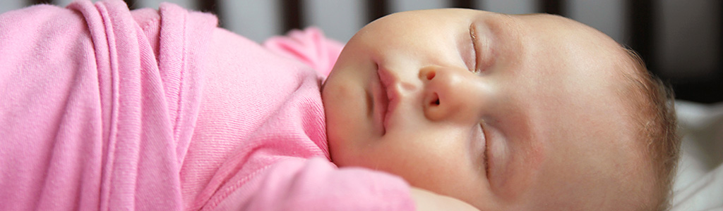 baby sleeping in crib