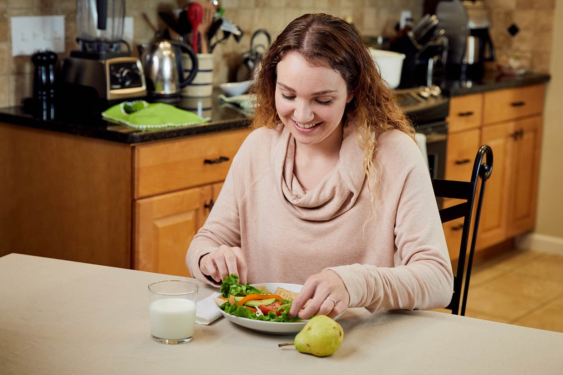 mom eating a balanced meal