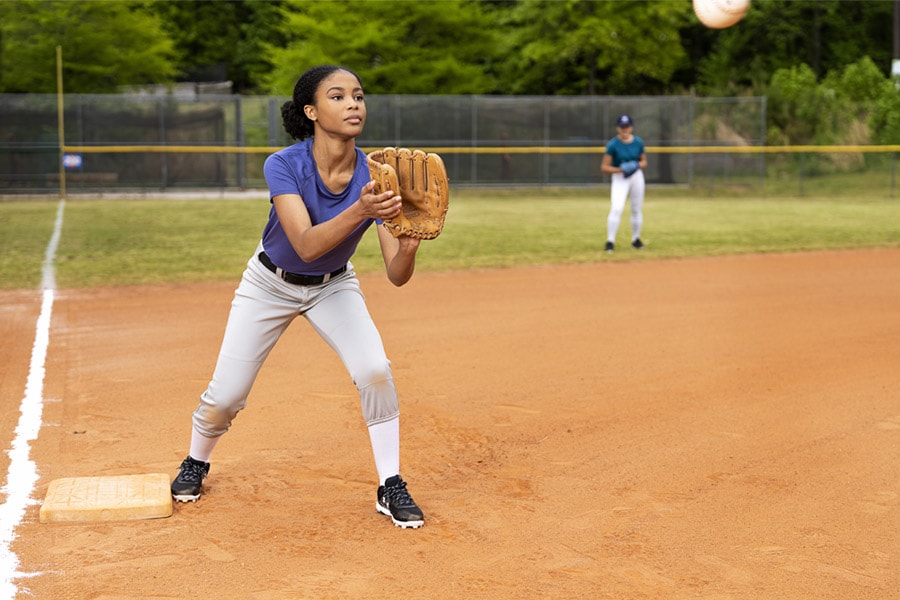 teen boys playing softball