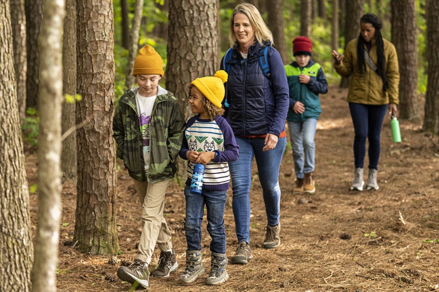 Family hiking in the woods