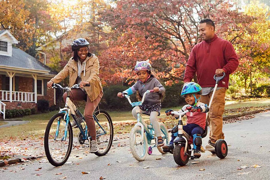 family riding bikes together