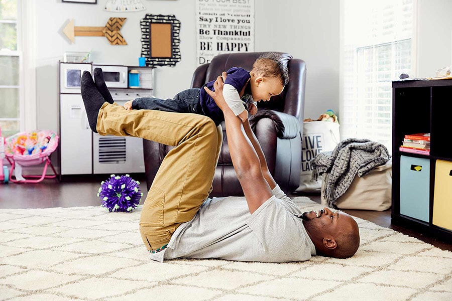 dad and son playing airplane