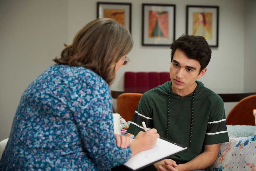 Teenage boy seeks help from a licensed mental health professional.