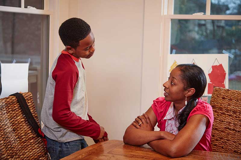 mom talking to son