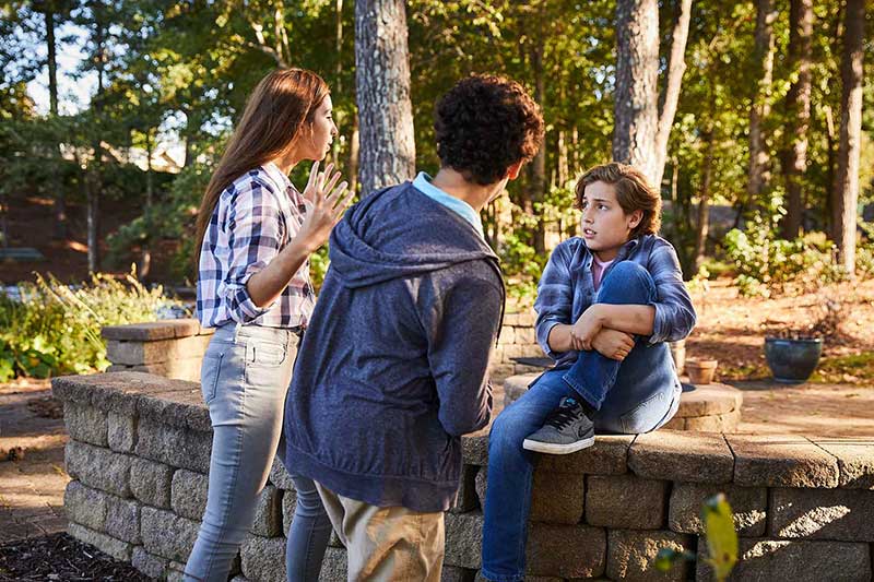 Child feeling isolated with other people around