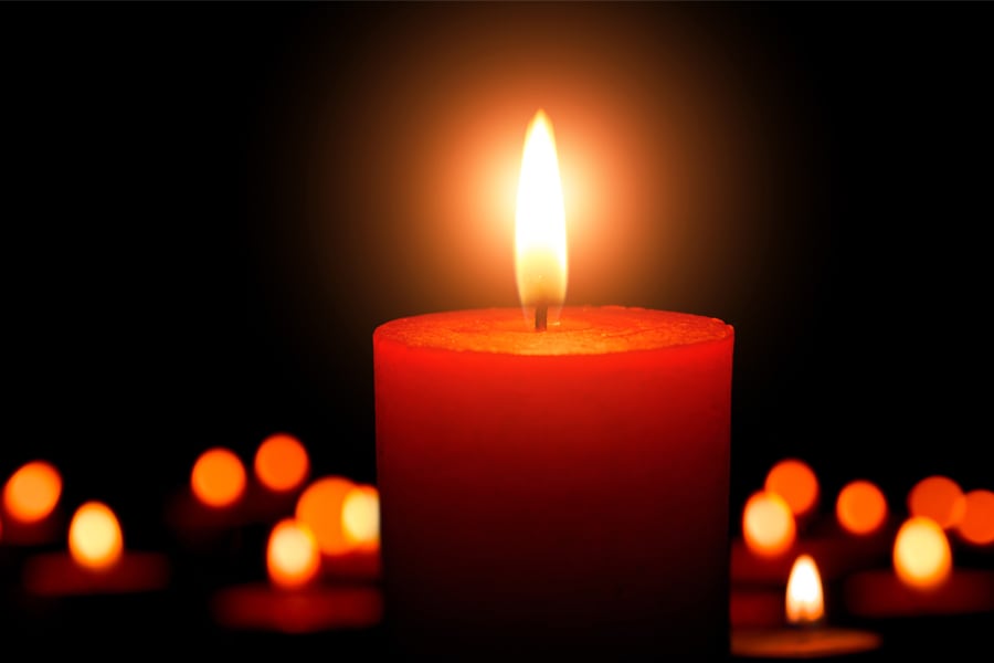 lit candle in memorium