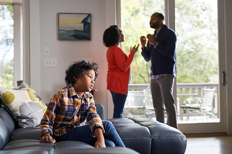 boy hearing parents argue