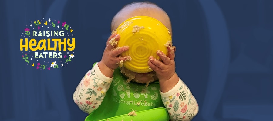 Infant eating a bowl of oatmeal alongside graphic which says "Raising Healthy Eaters"