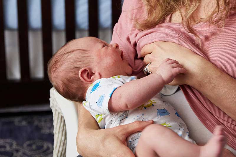 newborn crying during feeding