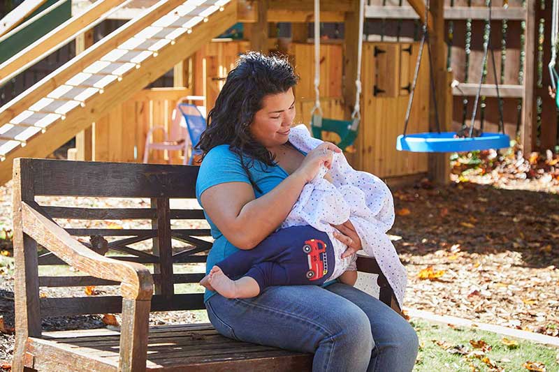 mom nursing with lightweight nursing cover