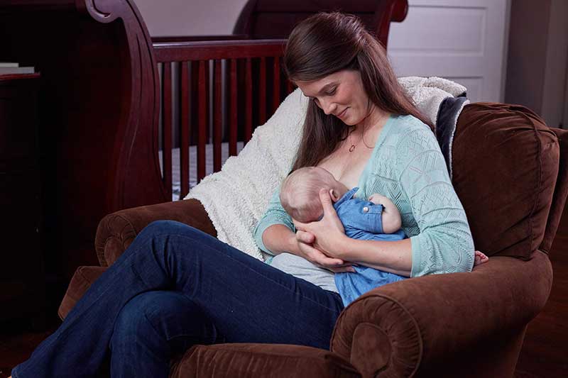 Mom breastfeeding infant