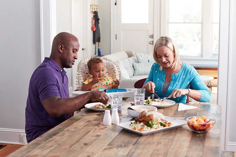 family eating at table