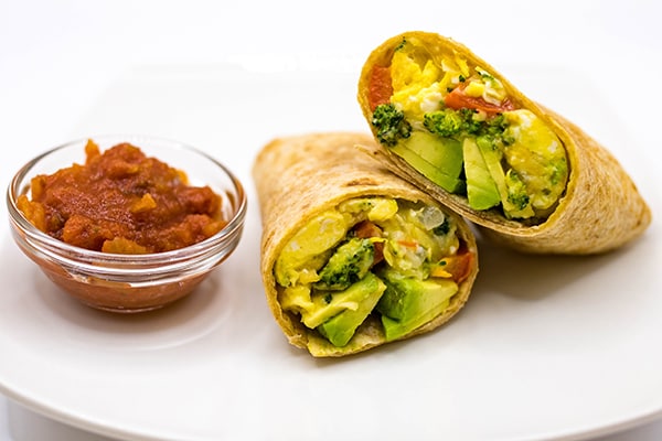 Nutritionally balanced breakfast burrito with salsa