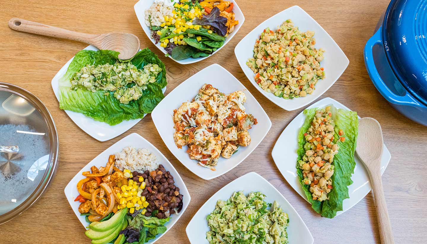 Aerial image of seven different family-friendly, dietitian-approved recipes