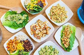 Aerial image of seven different family-friendly, dietitian-approved recipes