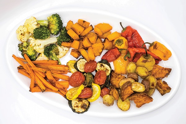 Picture of a plater filled with different roasted vegetables