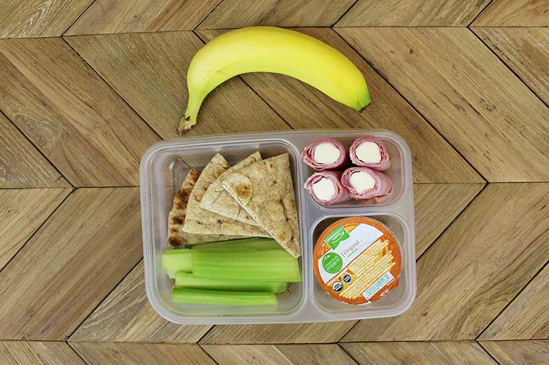Ham and cheese roll-up packed lunch for school