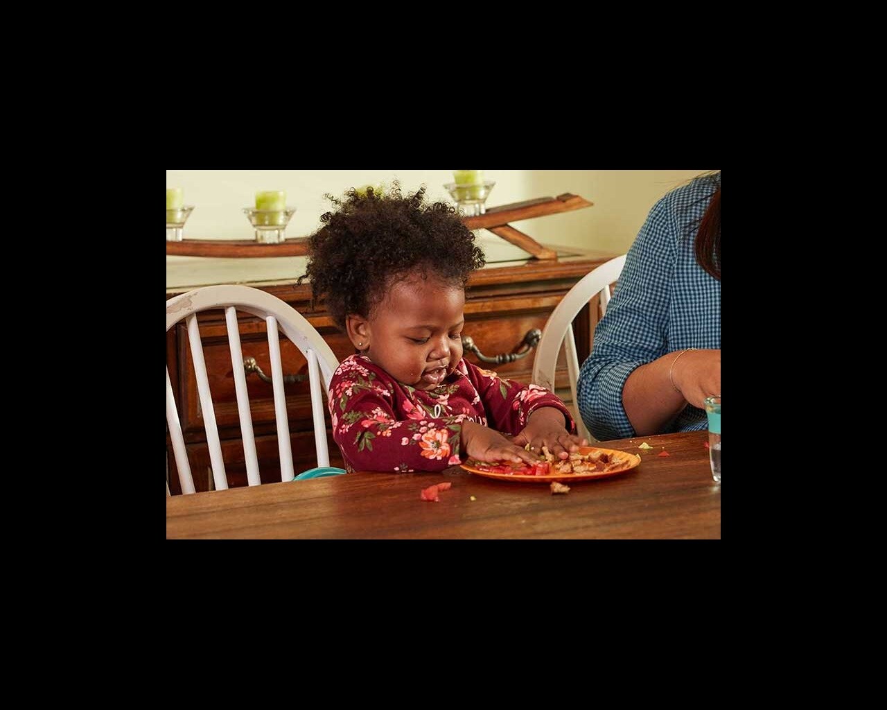 toddler playing with food
