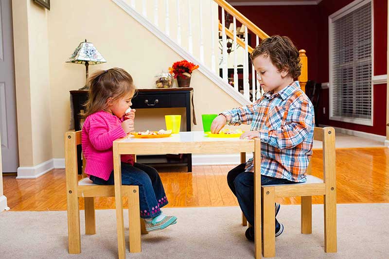 toddler with snack