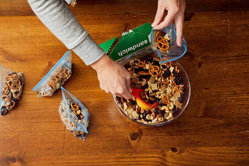 mom making big batch of trail mix