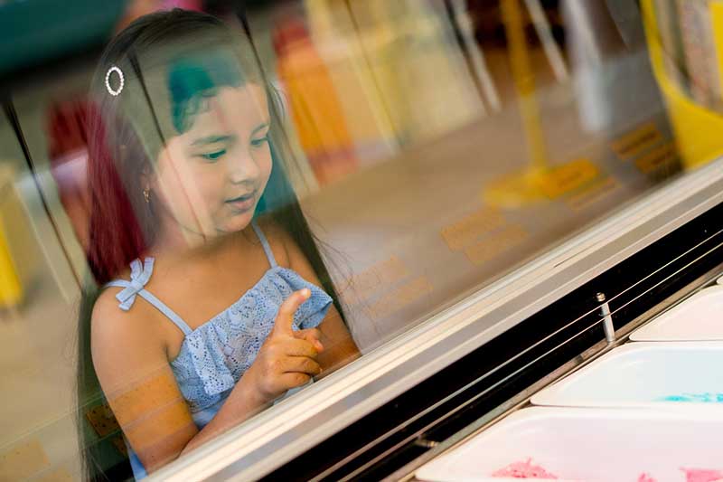 girl choosing ice cream flavor