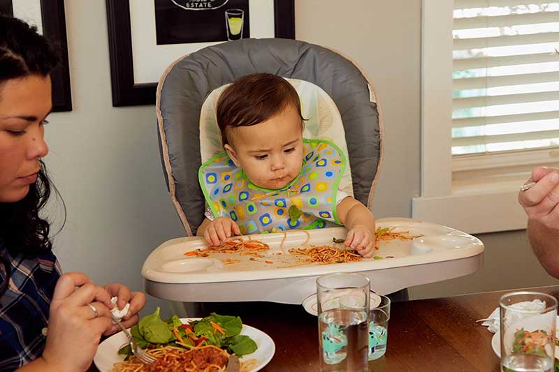9 month old eating spaghetti