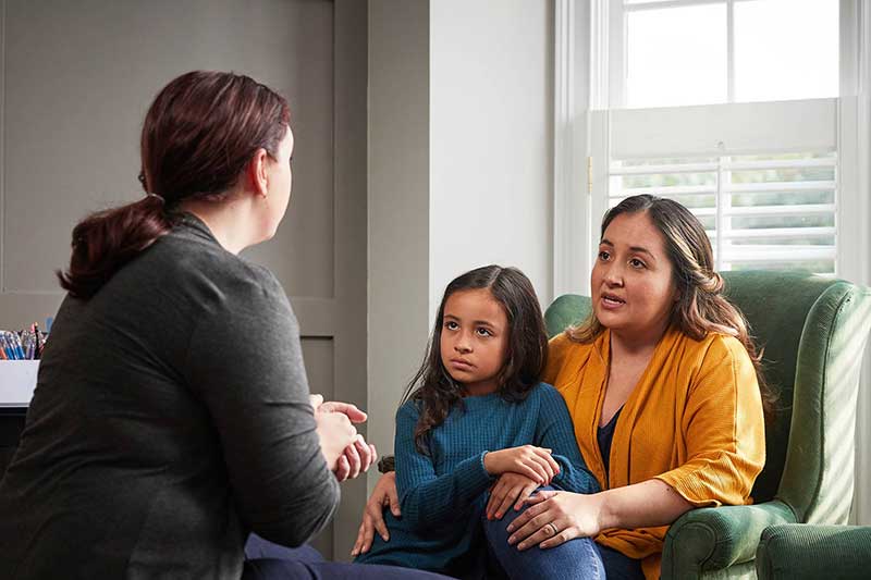 parent and child in a therapy session