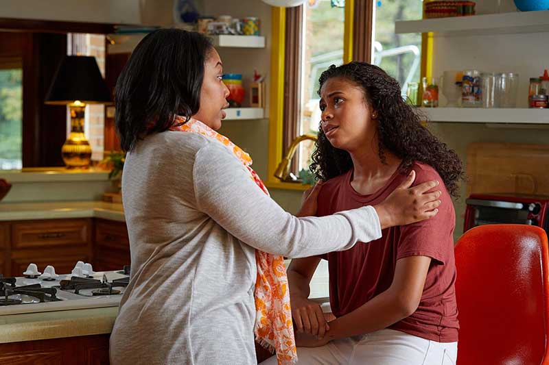 mom consoling upset daughter