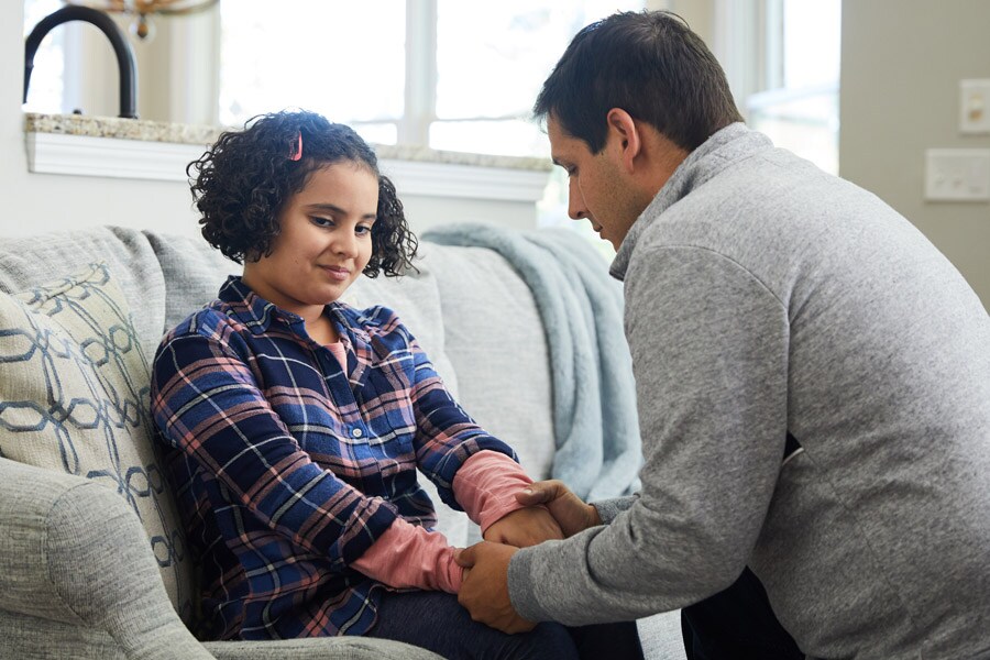 dad encouraging daughter after a setback