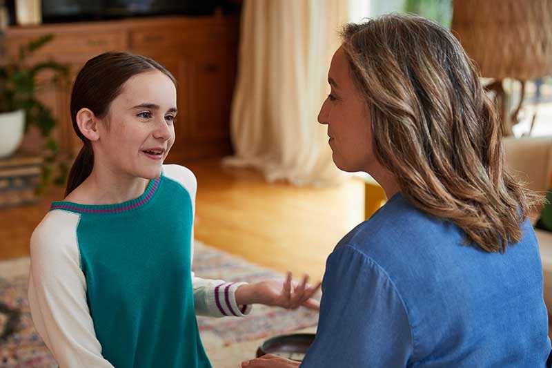 daughter talking with mom