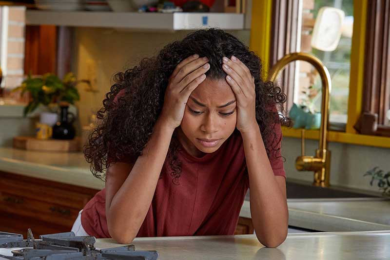 stressed girl in kitchen