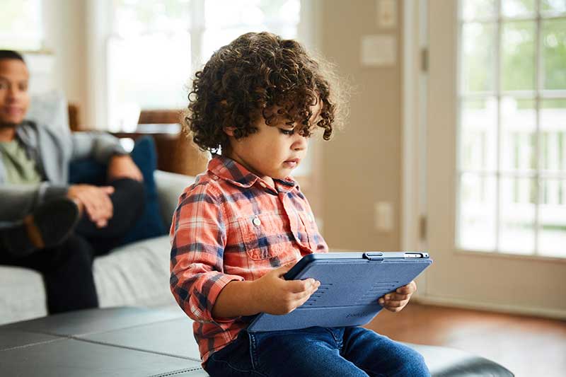 toddler using tablet