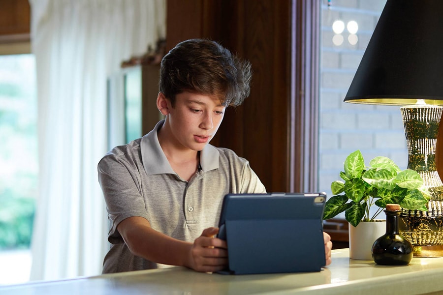 upset child looking at computer