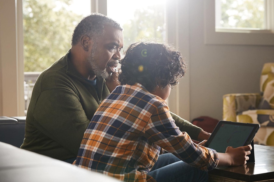 grandparent and young child online together