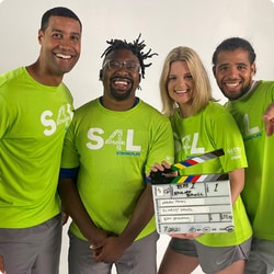 Behind the scenes photo of the Strong4Life Challenge Team filming the kick-off video