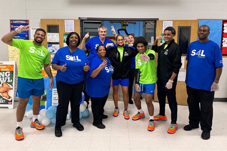 Strong4Life Challenge Team posing with school nutrition staff