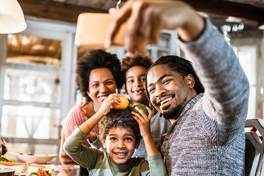 family using face time after holiday dinner