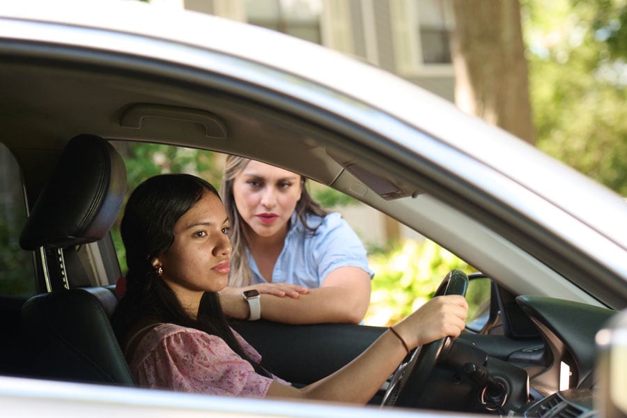 Teen girl talking to mom about driving