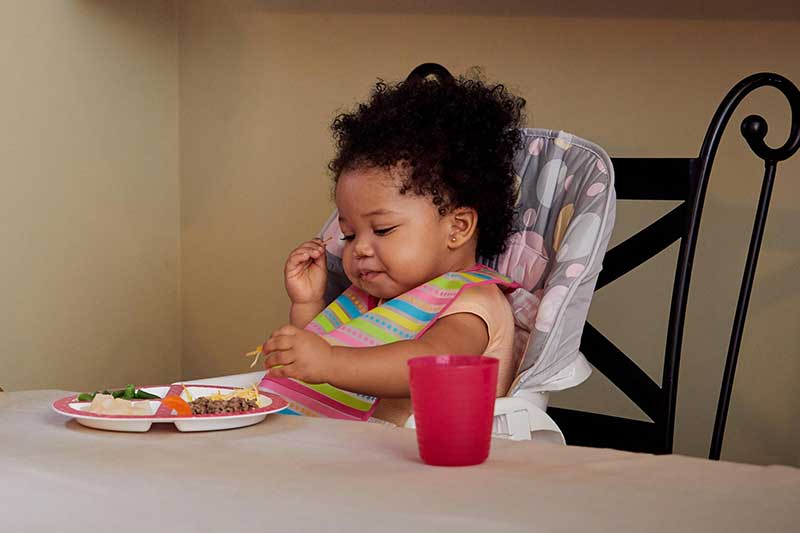 10 month old reaching for cheese