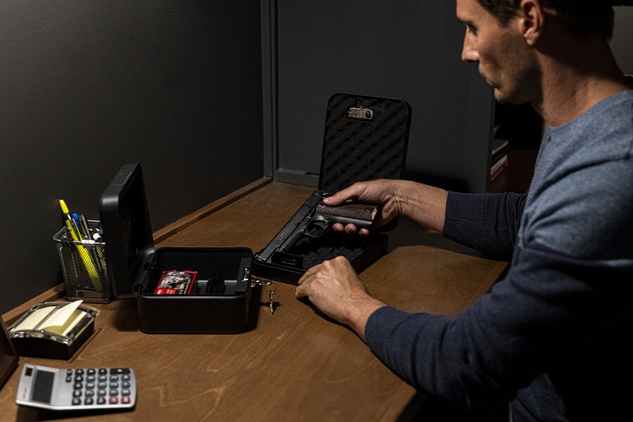 dad unloading gun and storing separately from ammunition 