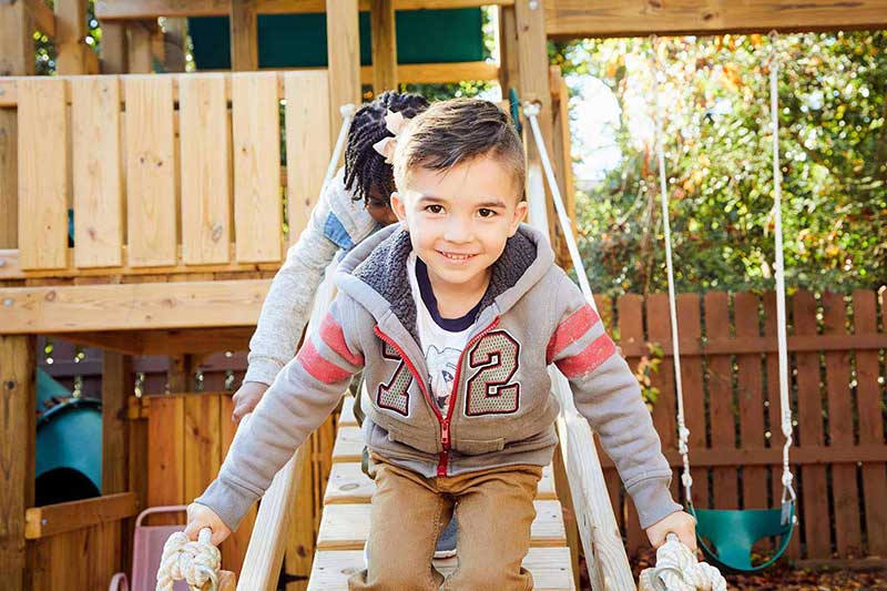 preschool boy on playground