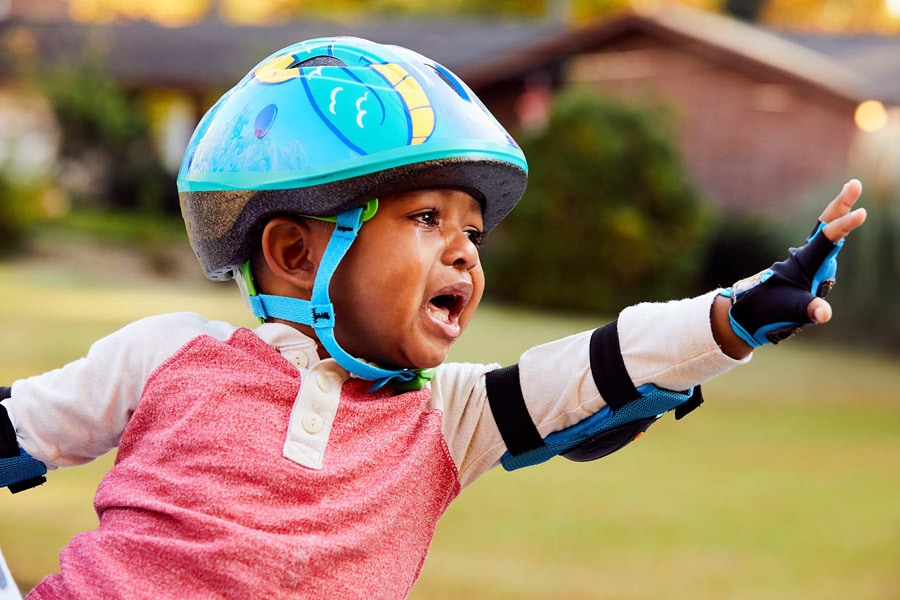 toddler crying while wearing helmet