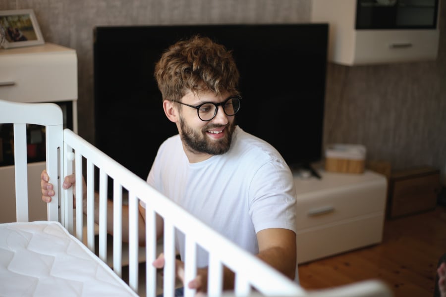 Dad creates a safe sleep space for his baby