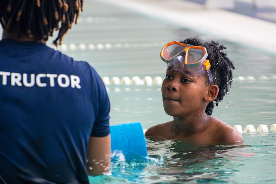 Swim lesson at metro Atlanta YMCA to practice water safety and drowning prevention. 