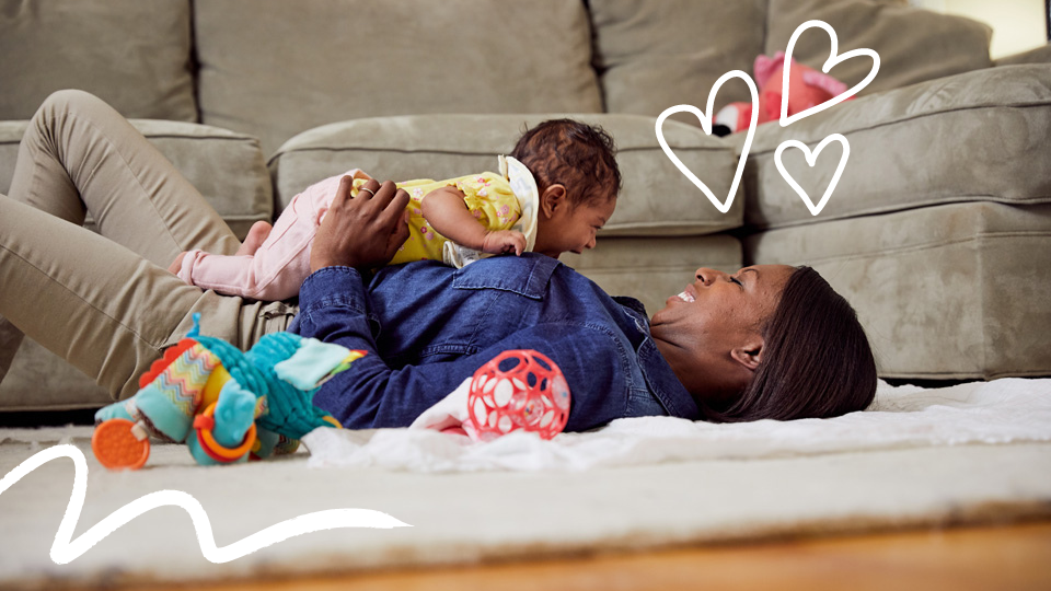 Mom shows the benefits of tummy time as she bonds with her baby 