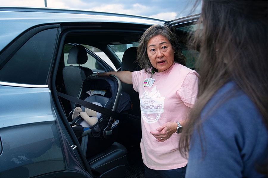A CPST teaches a parent how to properly install and use their car seat.